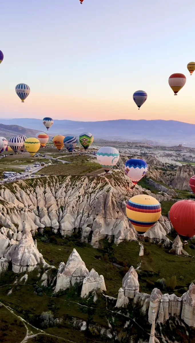Colorful hot air balloons over the fairy chimneys of Cappadocia